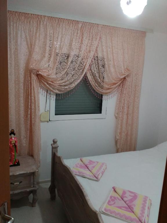A bed or beds in a room at Villa Avdira