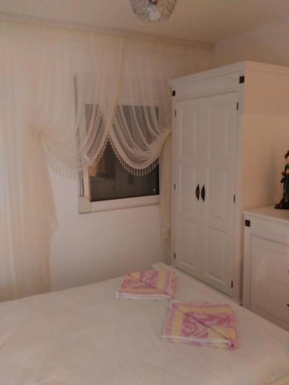 A bed or beds in a room at Villa Avdira