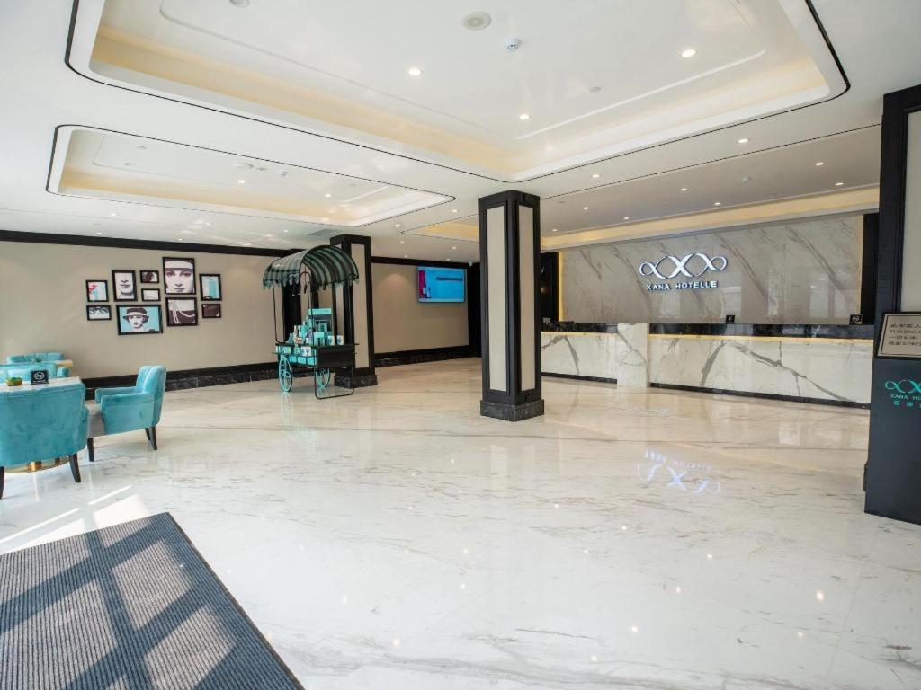 TV a/nebo společenská místnost v ubytování Xana Hotelle Zhongshan Bus Terminal Fuhuang Road Tianyuecheng