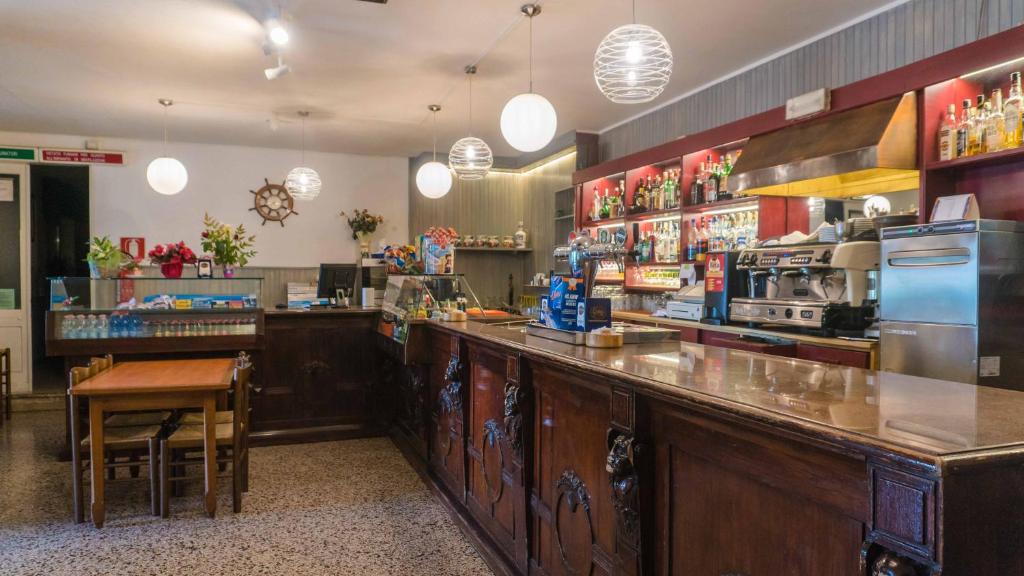 Kuchyň nebo kuchyňský kout v ubytování Ristorante Albergo Al Donatore