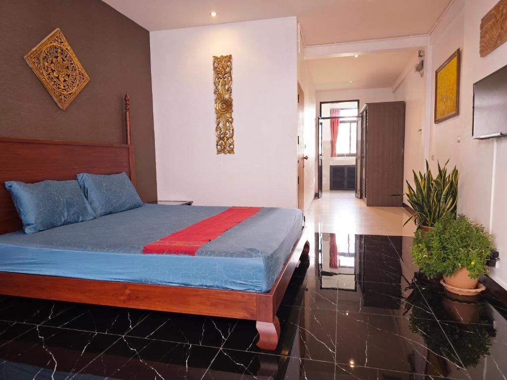 Ένα ή περισσότερα κρεβάτια σε δωμάτιο στο Old Spice 4 Downtown Serenity Luxurious Oasis BKK