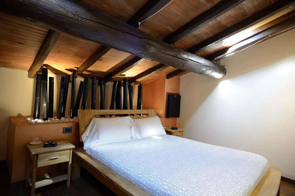 Posteľ alebo postele v izbe v ubytovaní Agriturismo Corte Acconi