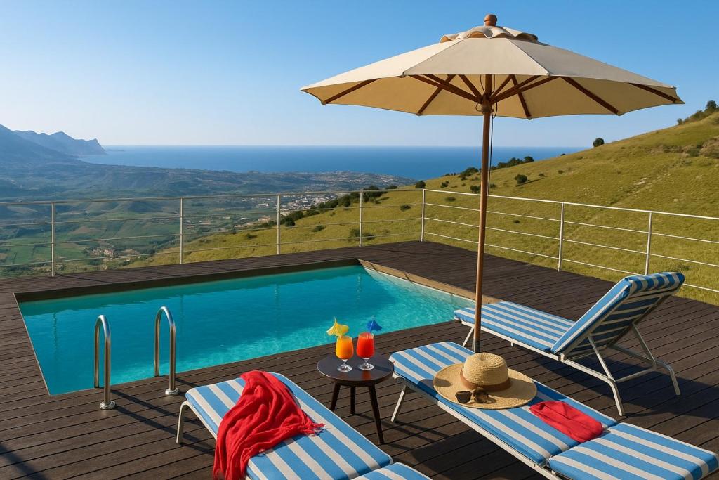 una piscina con due sedie e un ombrellone di Villetta Bonifato con Vista Mozzafiato ad Alcamo