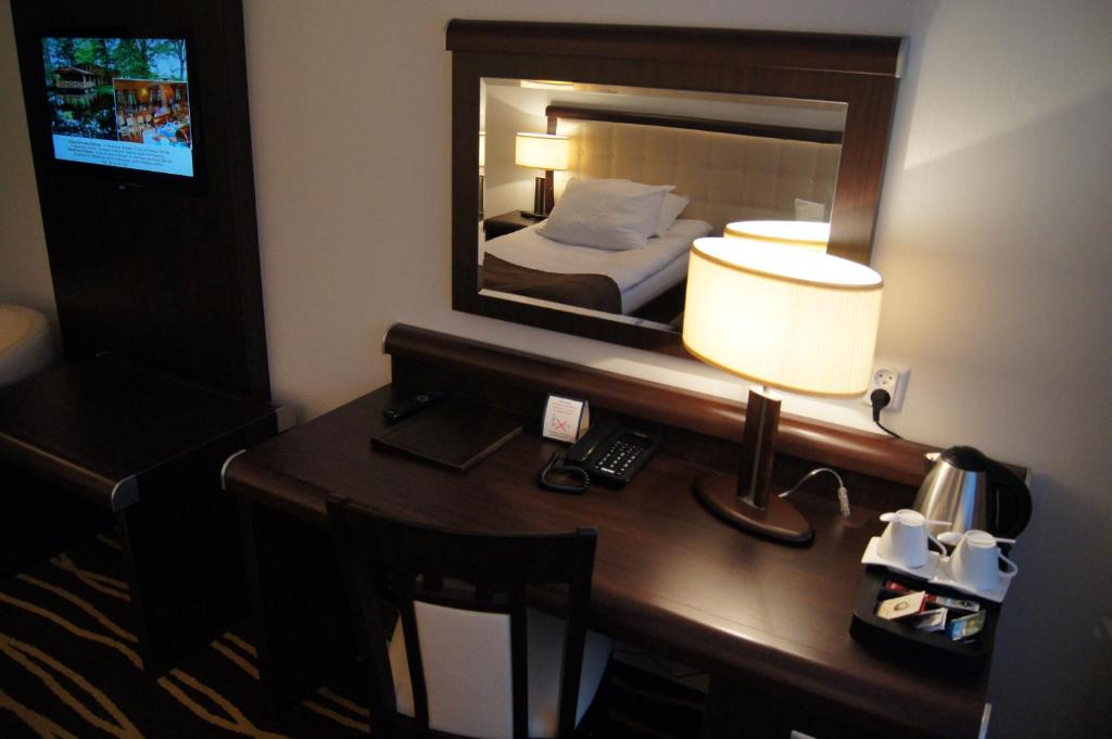 TV a/nebo společenská místnost v ubytování Hotel Business Faltom Gdynia