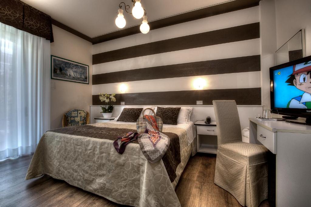 Телевизор и/или развлекательный центр в Hotel Ca' D'Oro Tre Stelle Superior Adults only