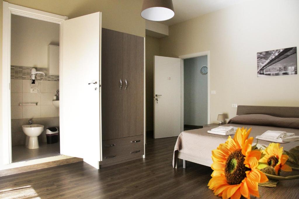 A bed or beds in a room at Affittacamere Sogni D'oro