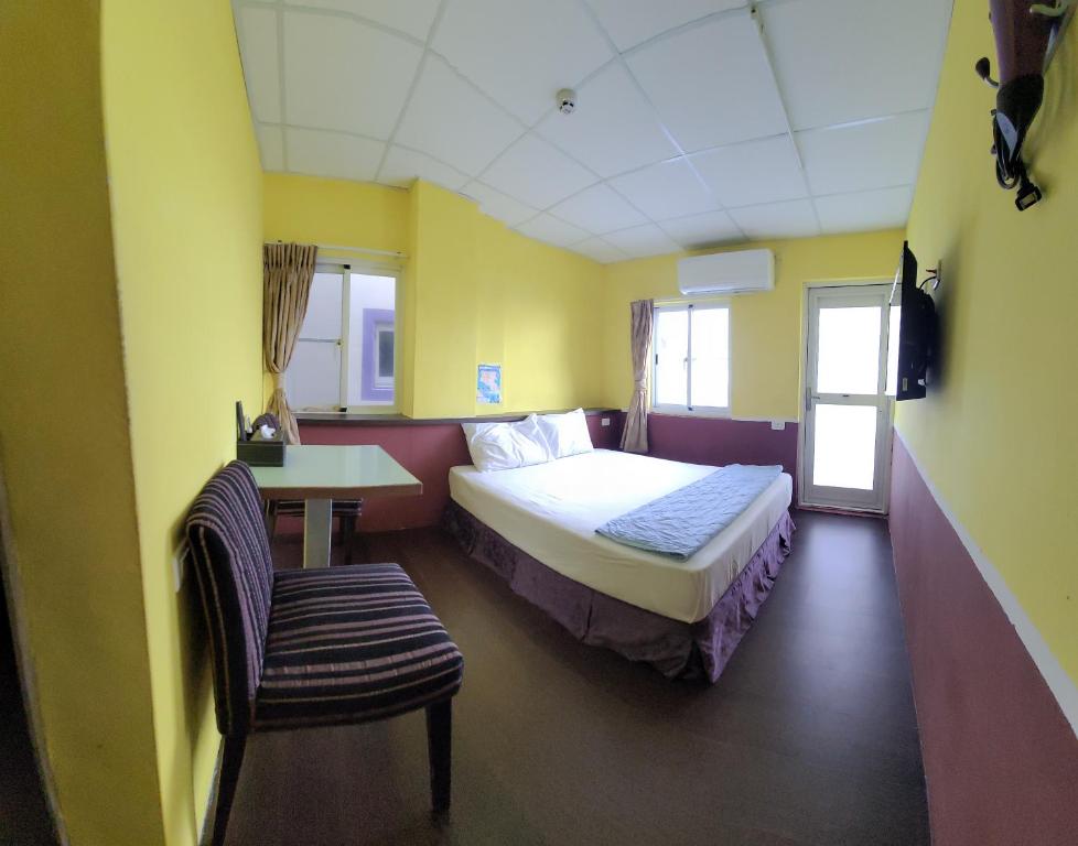 Postel nebo postele na pokoji v ubytování Lanyu Gulu Homestay