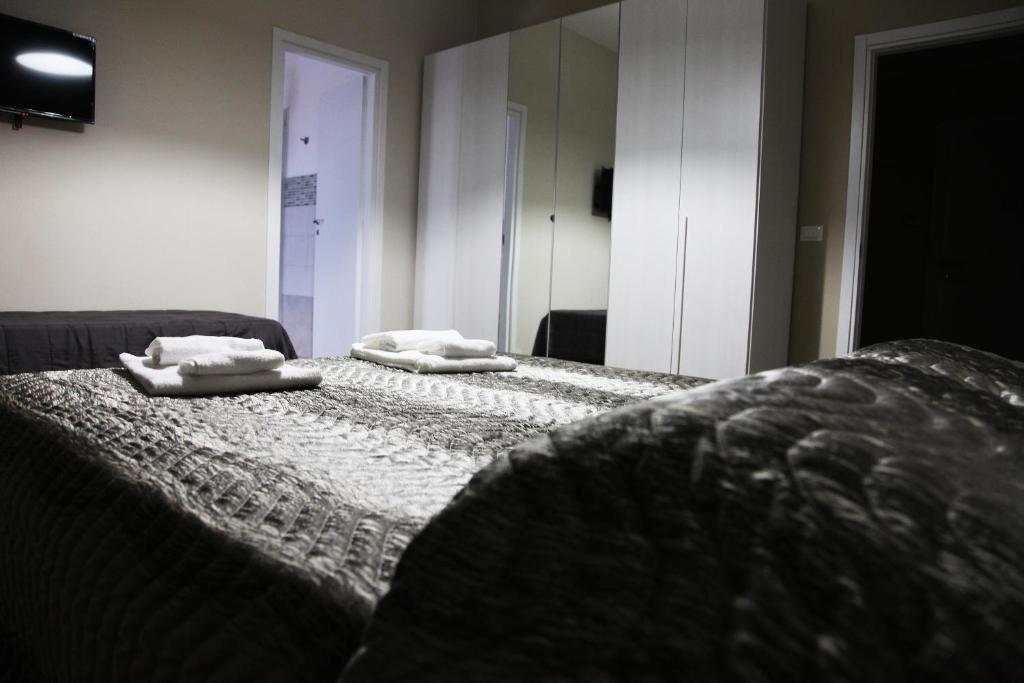 A bed or beds in a room at Affittacamere Sogni D'oro