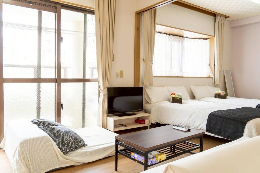 Χώρος καθιστικού στο Maison Tsunami