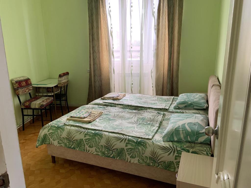 Postel nebo postele na pokoji v ubytování Guest House Lilia