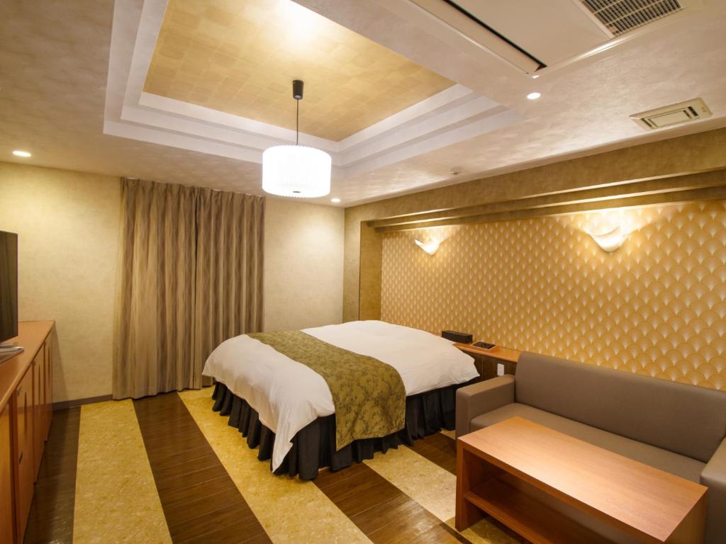Postel nebo postele na pokoji v ubytování Hotel S
