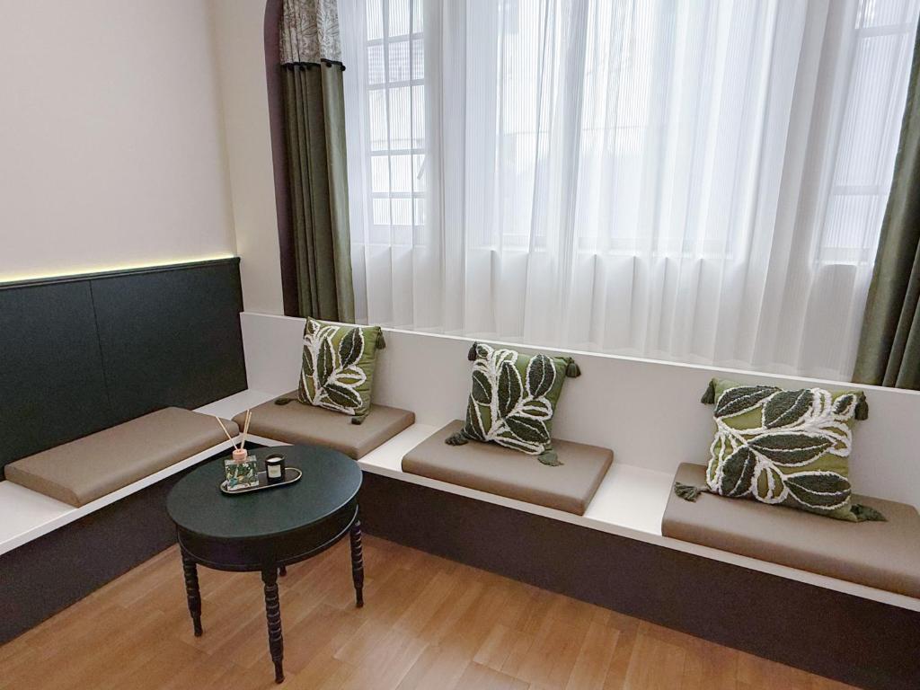 Posezení v ubytování Vishan Garden Boutique Hotel 厦门维尚花园潮宿 中山路步行街店