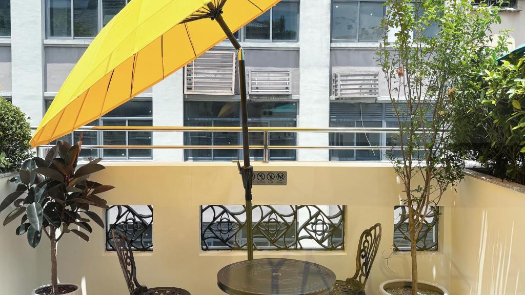 Balkón nebo terasa v ubytování Vishan Garden Boutique Hotel 厦门维尚花园潮宿 中山路步行街店