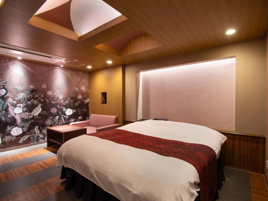 Postel nebo postele na pokoji v ubytování Hotel S