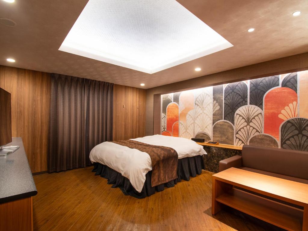 Postel nebo postele na pokoji v ubytování Hotel S