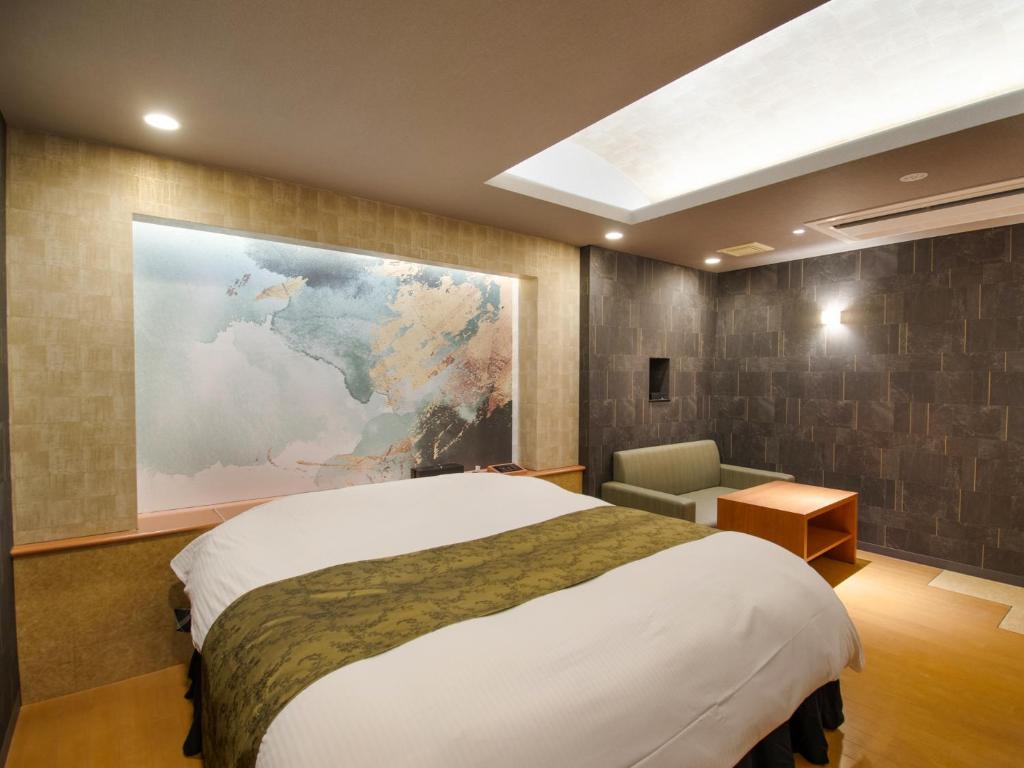 Postel nebo postele na pokoji v ubytování Hotel S