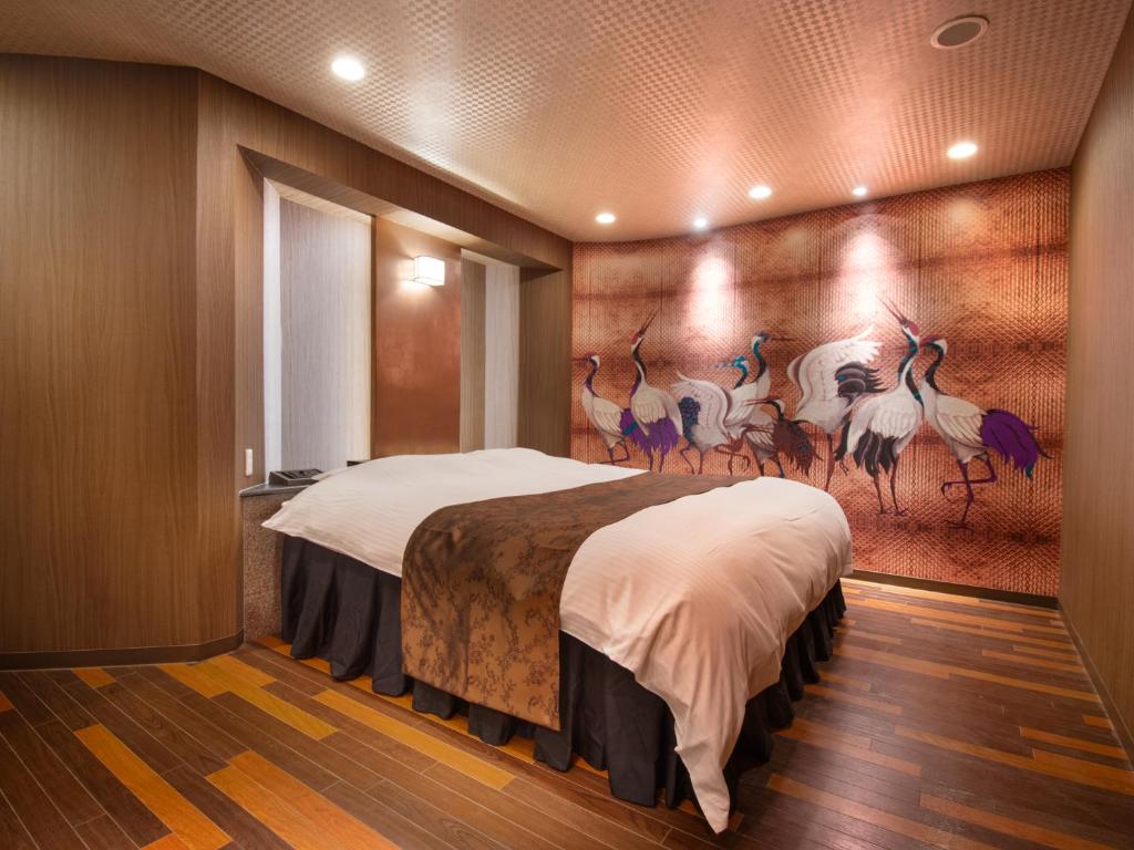 Postel nebo postele na pokoji v ubytování Hotel S