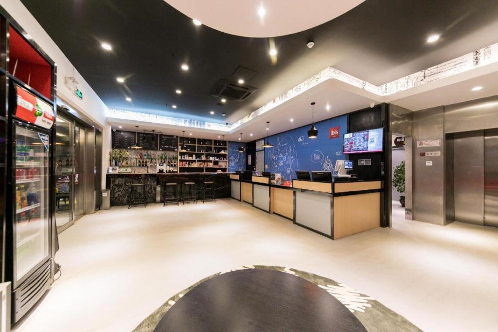 Kuchyň nebo kuchyňský kout v ubytování Ibis Nantong Qingnian