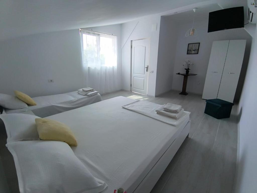 Postel nebo postele na pokoji v ubytování Casa AnaMaria