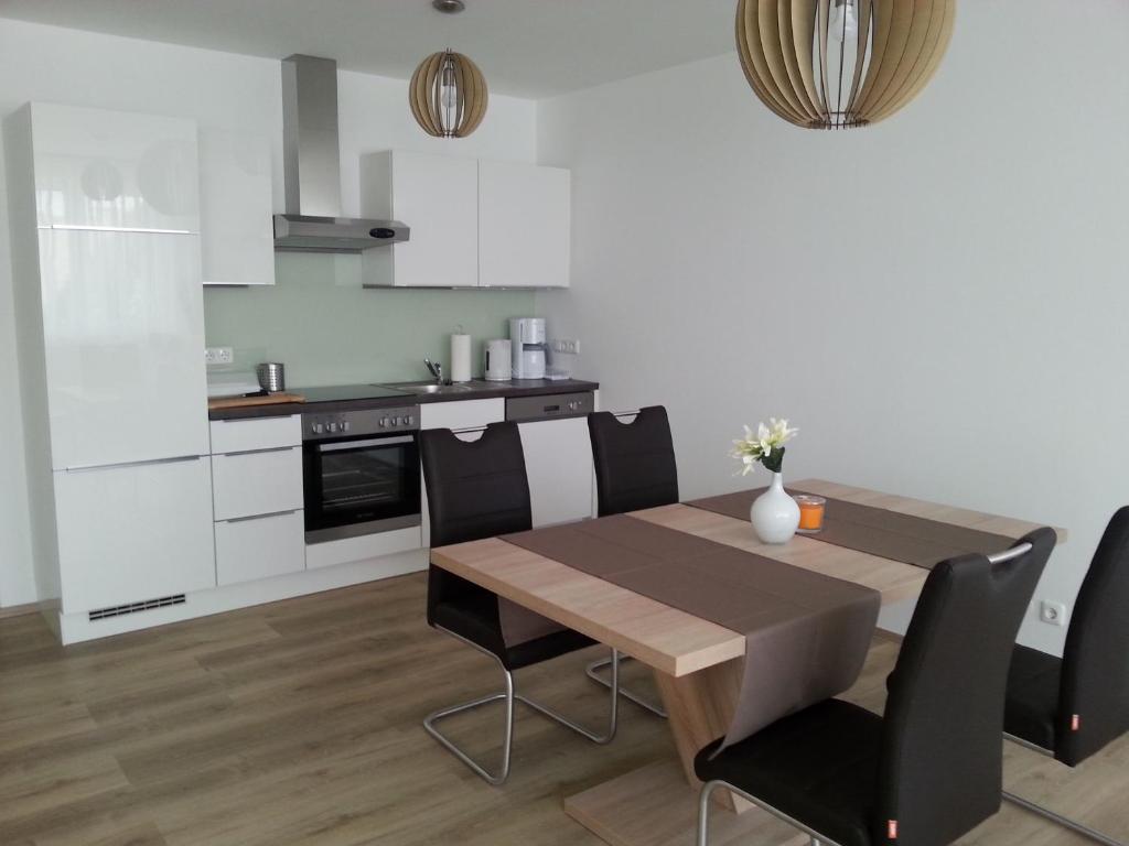 Kuchyň nebo kuchyňský kout v ubytování PENTHOUSE Griemann 2 für max 4 Personen mit eigener großer Dachterrasse zum Relaxen!