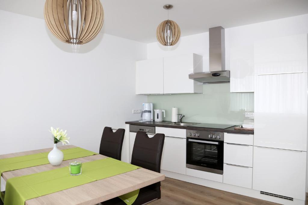 Kuchyň nebo kuchyňský kout v ubytování PENTHOUSE Griemann 2 für max 4 Personen mit eigener großer Dachterrasse zum Relaxen!