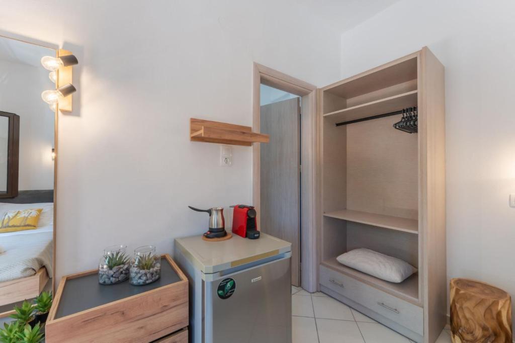 Kuchnia lub aneks kuchenny w obiekcie SKYROS AVRA Residences