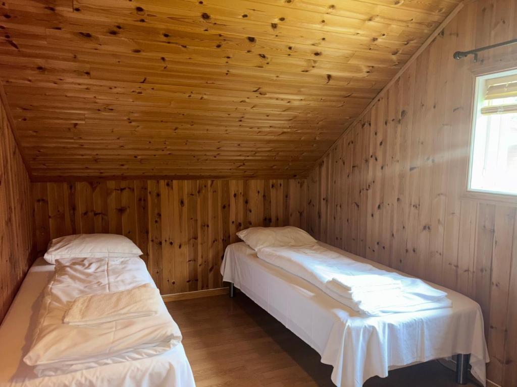 Postel nebo postele na pokoji v ubytování Winjum Apartments Aurland Stegastein