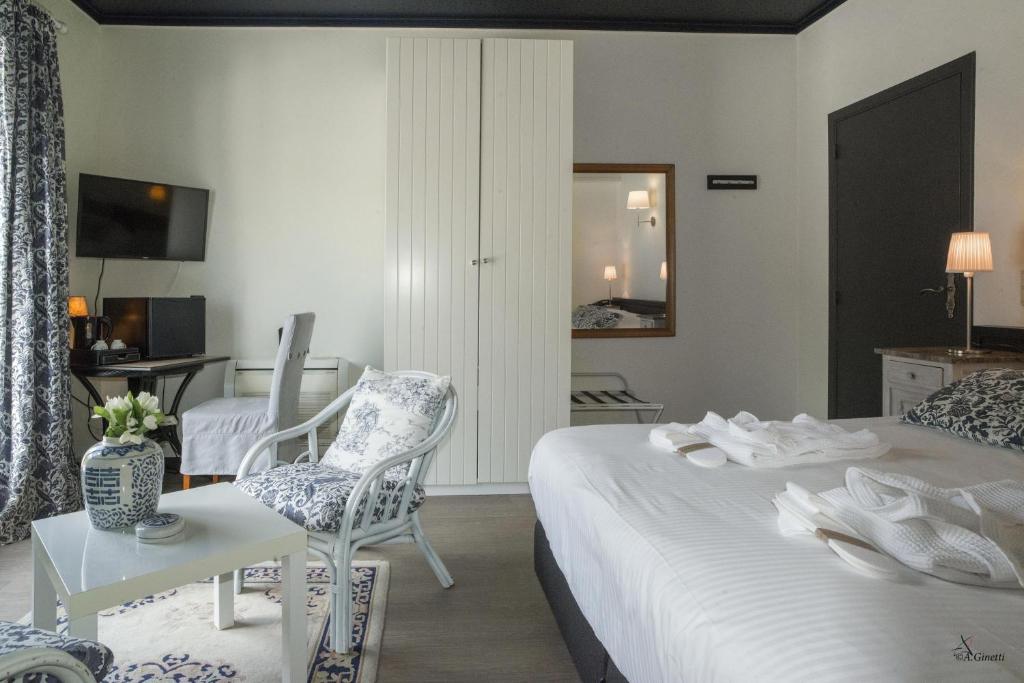 Postel nebo postele na pokoji v ubytování Tropical Hotel