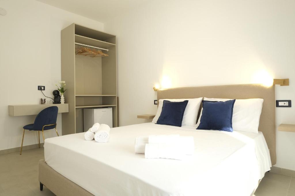 Postel nebo postele na pokoji v ubytování Marephis Rooms - Alghero