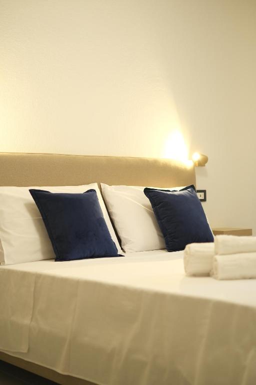 Postel nebo postele na pokoji v ubytování Marephis Rooms - Alghero