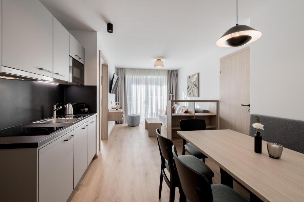 Kuchyň nebo kuchyňský kout v ubytování Aparthotel Tante Trude