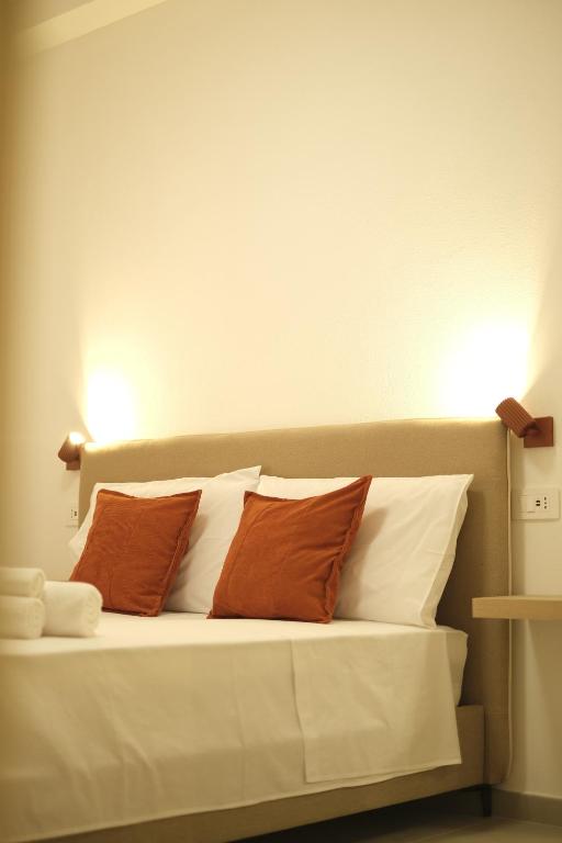 Postel nebo postele na pokoji v ubytování Marephis Rooms - Alghero