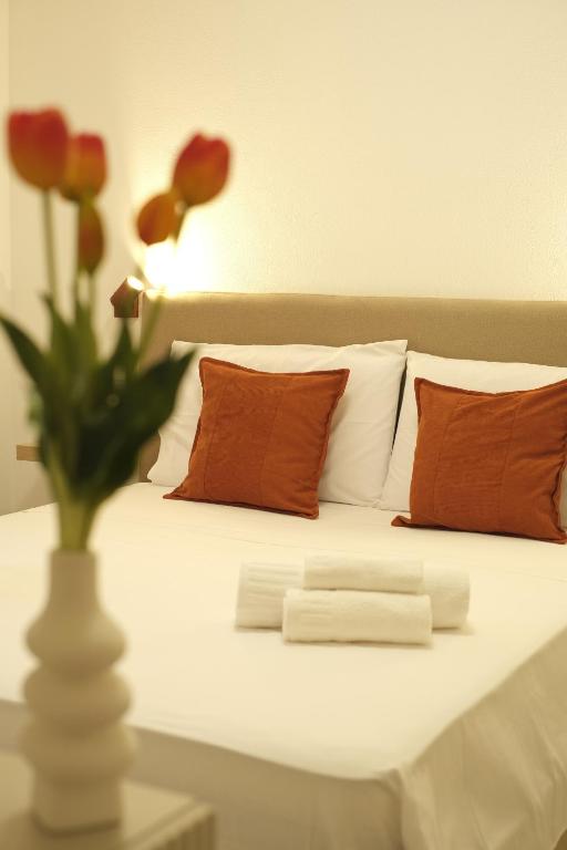 Postel nebo postele na pokoji v ubytování Marephis Rooms - Alghero