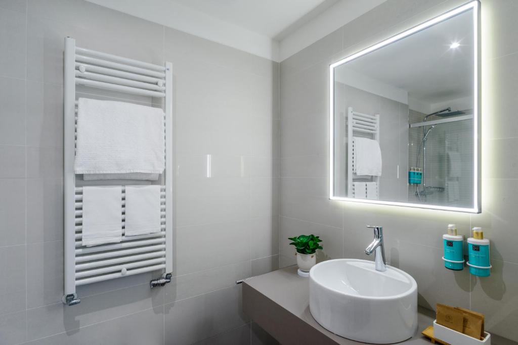 Koupelna v ubytování Novotel Parma Centro