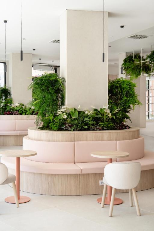 Uma área de estar em Hotel RH Arena - Todo Incluido