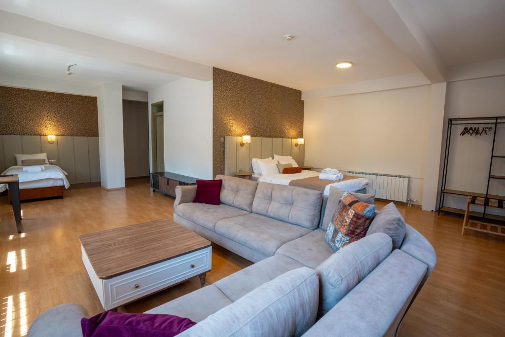 Postel nebo postele na pokoji v ubytování Saffron Boutique Hotel