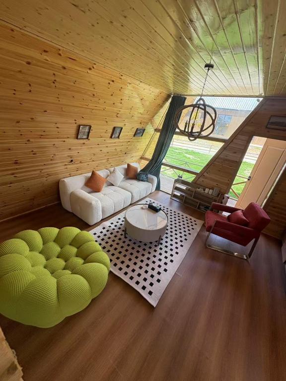 Posezení v ubytování Fengchui Banxia Manor Wild Luxury Camp