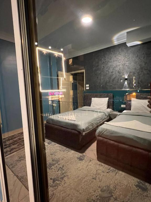 Postel nebo postele na pokoji v ubytování Beko pyramids inn