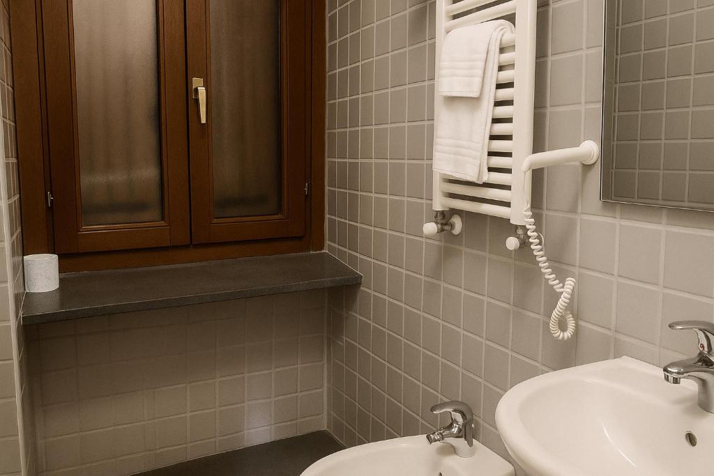 Koupelna v ubytování Albergo Reale