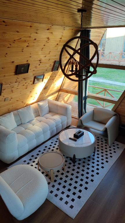 Posezení v ubytování Fengchui Banxia Manor Wild Luxury Camp
