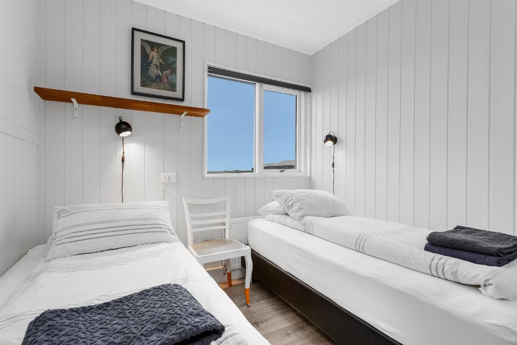 Postel nebo postele na pokoji v ubytování Ocean Break Cabins