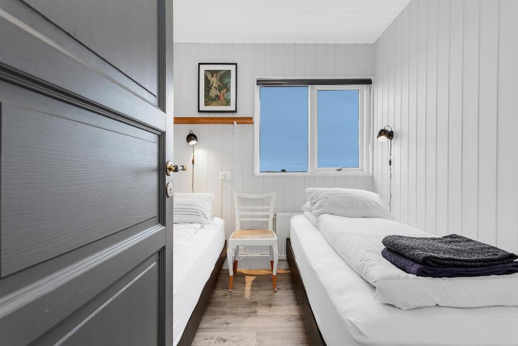 Postel nebo postele na pokoji v ubytování Ocean Break Cabins