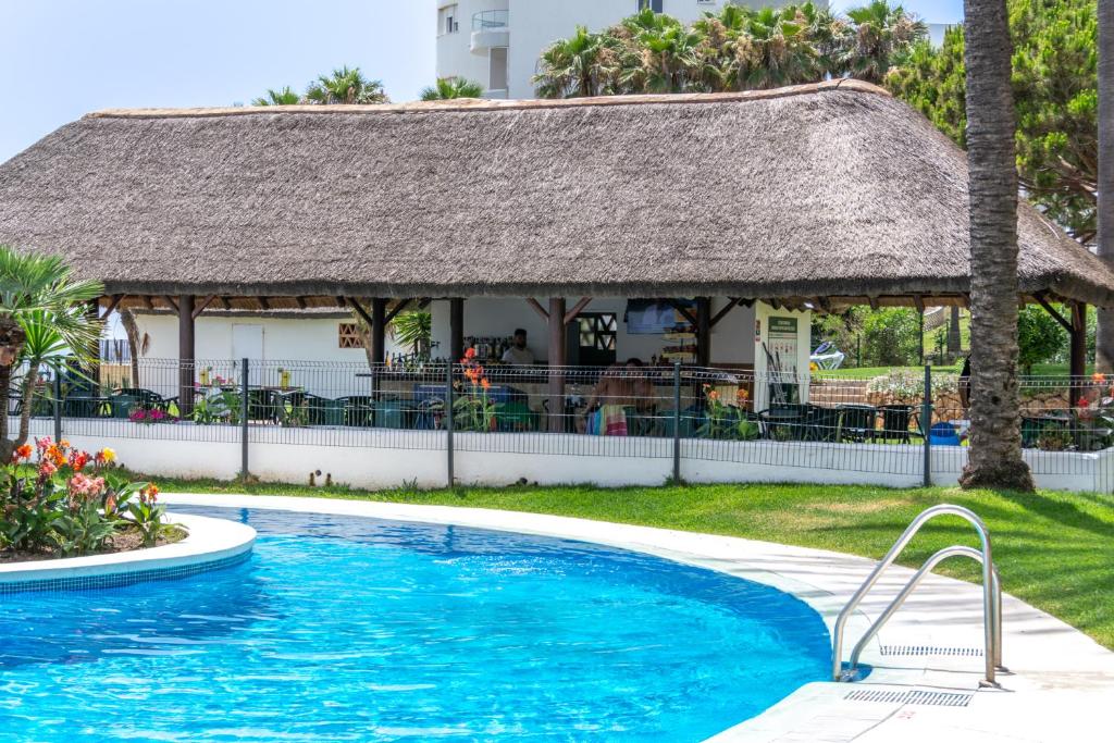 Bazén v ubytovaní Mi Capricho Playa Marbella alebo v jeho blízkosti
