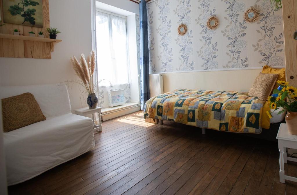 Postel nebo postele na pokoji v ubytování Ambiance Morvan