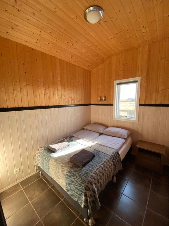Postel nebo postele na pokoji v ubytování Ocean Break Cabins