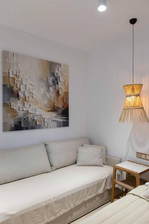 Postel nebo postele na pokoji v ubytování Linari Sea & Suites