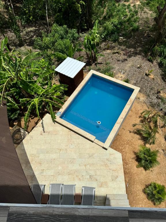 Bazén v ubytování Tree Top Suites & Resort nebo v jeho okolí