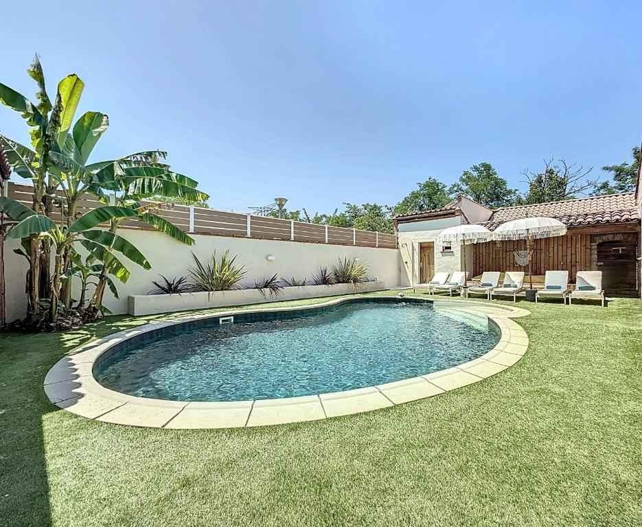 Bazén v ubytování L'Oliveraie d'Eurocentre - Piscine et Spa - Paradis des enfants nebo v jeho okolí