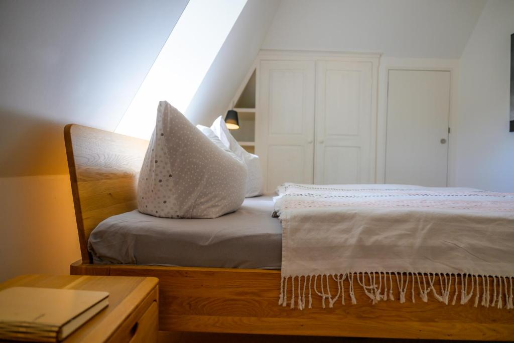 Postel nebo postele na pokoji v ubytování Tammwarftshof