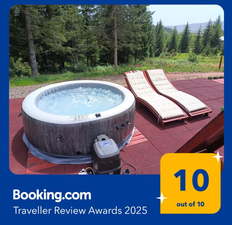 a hot tub with a lounger and a bench at Chechar Inn Zlatar in Nova Varoš